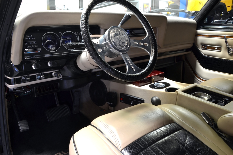 Illustration for article titled For $85,000, This 1984 Jeep Grand Wagoneer Ain’t For No Girly Man
